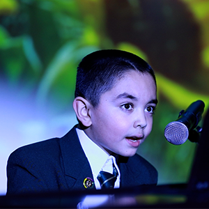 Best Private Elementary School in Annandale VA | Private School in Annandale | Student Speaking at Podium