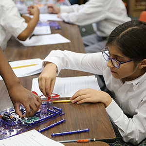 Best Private Elementary School in Annandale VA | Top Private School in Annandale VA | Student Working on a Science Project