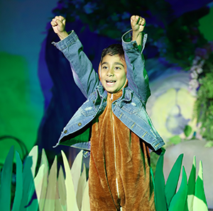 First Grade performs Peter Rabbit on stage