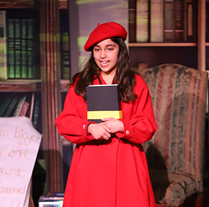 Third Grade performs The Enchanted Bookshop on stage