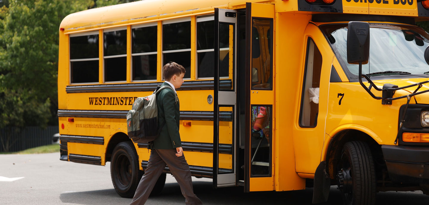 bus student getting on a bus