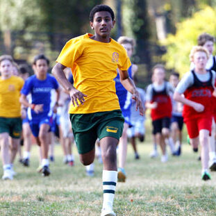 athletics-mega boy running in a race outside